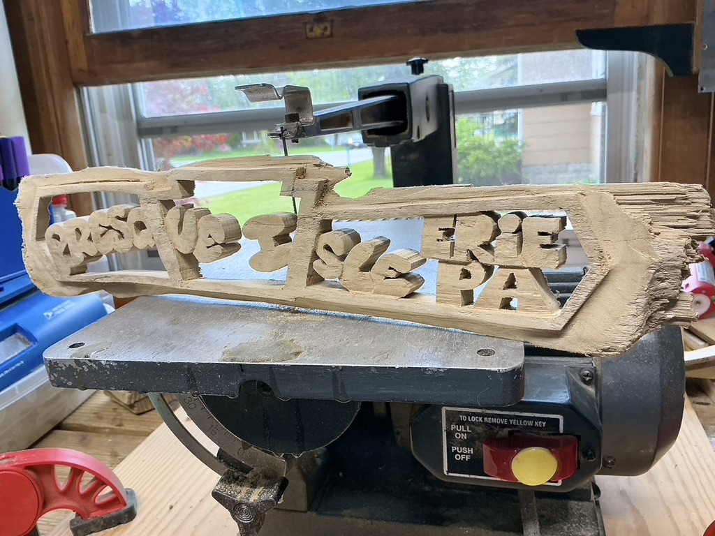 Mathew Skelly working on driftwood